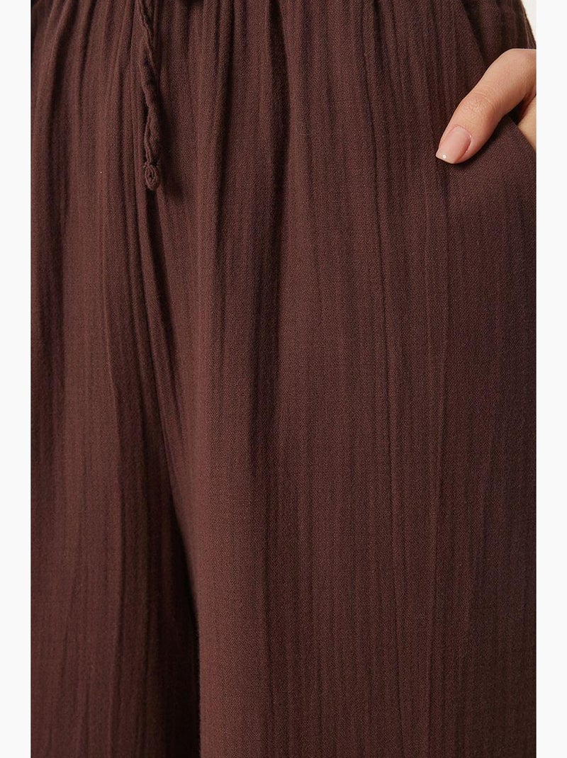 Pantaloni a gamba ampia con coulisse in vita e dettaglio con bordino istanbul Marrone - Kiabi