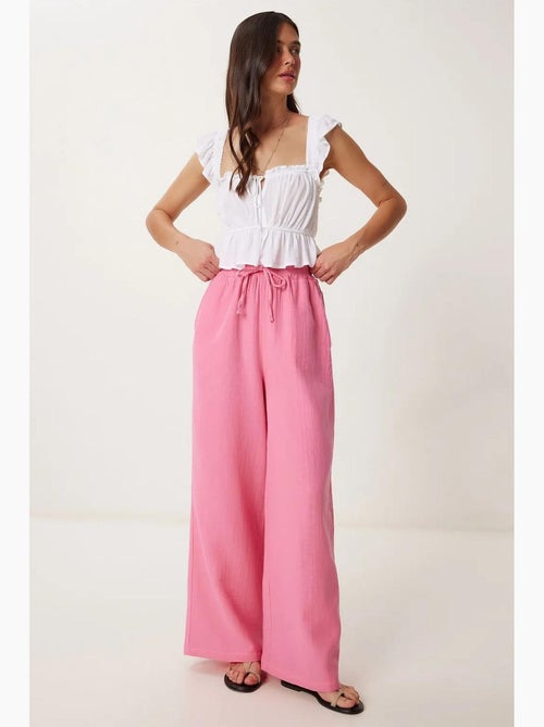 Pantaloni a gamba ampia con coulisse in vita e dettaglio con bordino istanbul - Kiabi Pantaloni a gamba ampia con coulisse in vita e dettaglio con bordino istanbul - Kiabi