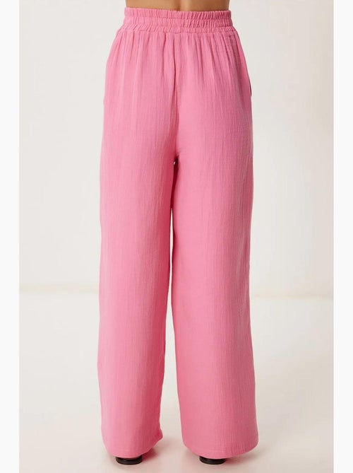 Pantaloni a gamba ampia con coulisse in vita e dettaglio con bordino istanbul - Kiabi Pantaloni a gamba ampia con coulisse in vita e dettaglio con bordino istanbul - Kiabi