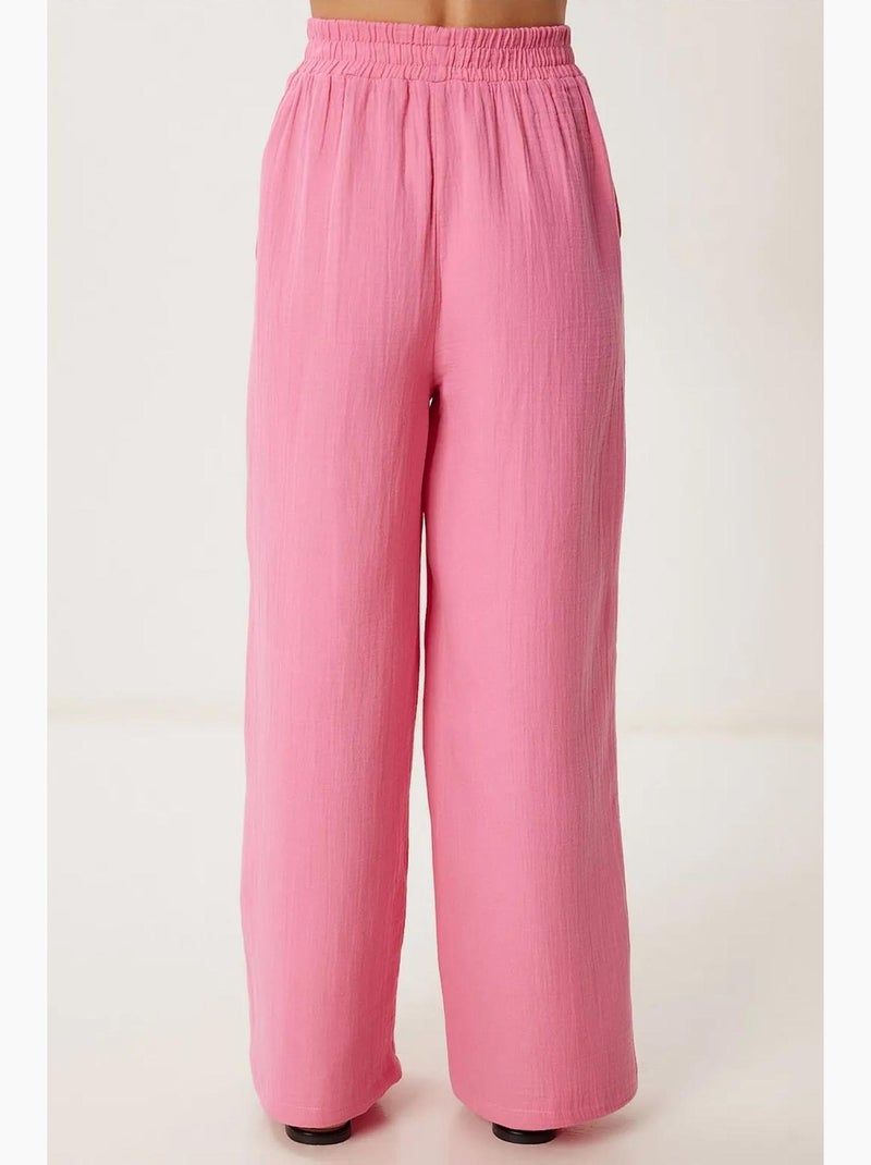 Pantaloni a gamba ampia con coulisse in vita e dettaglio con bordino istanbul Rosa fluo/Solinotes - Kiabi