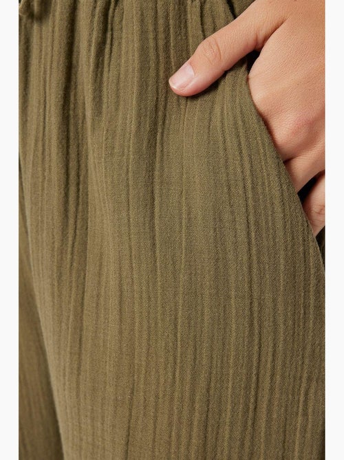 Pantaloni a gamba ampia con coulisse in vita e dettaglio con bordino istanbul - Kiabi Pantaloni a gamba ampia con coulisse in vita e dettaglio con bordino istanbul - Kiabi