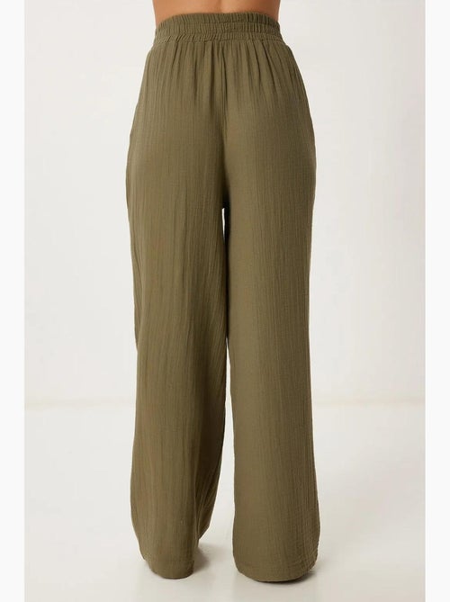 Pantaloni a gamba ampia con coulisse in vita e dettaglio con bordino istanbul - Kiabi Pantaloni a gamba ampia con coulisse in vita e dettaglio con bordino istanbul - Kiabi