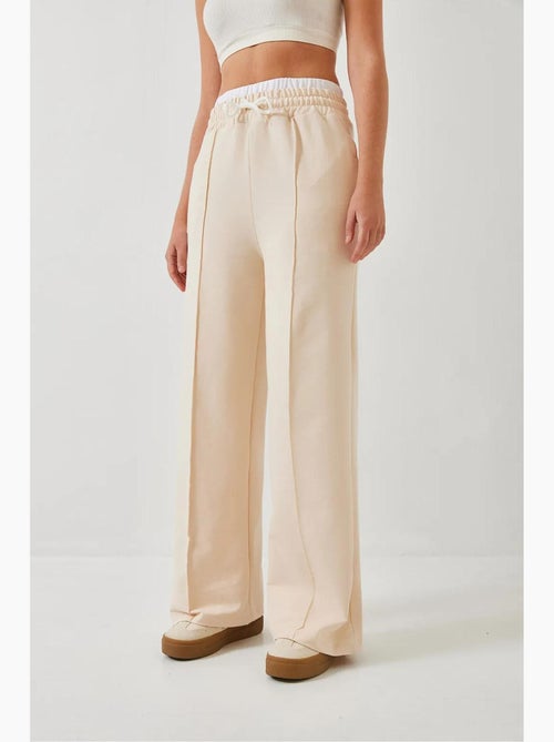 Pantaloni a gamba ampia con dettaglio cintura lucci - Kiabi Pantaloni a gamba ampia con dettaglio cintura lucci - Kiabi