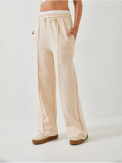 Pantaloni a gamba ampia con dettaglio cintura lucci - Kiabi Pantaloni a gamba ampia con dettaglio cintura lucci - Kiabi