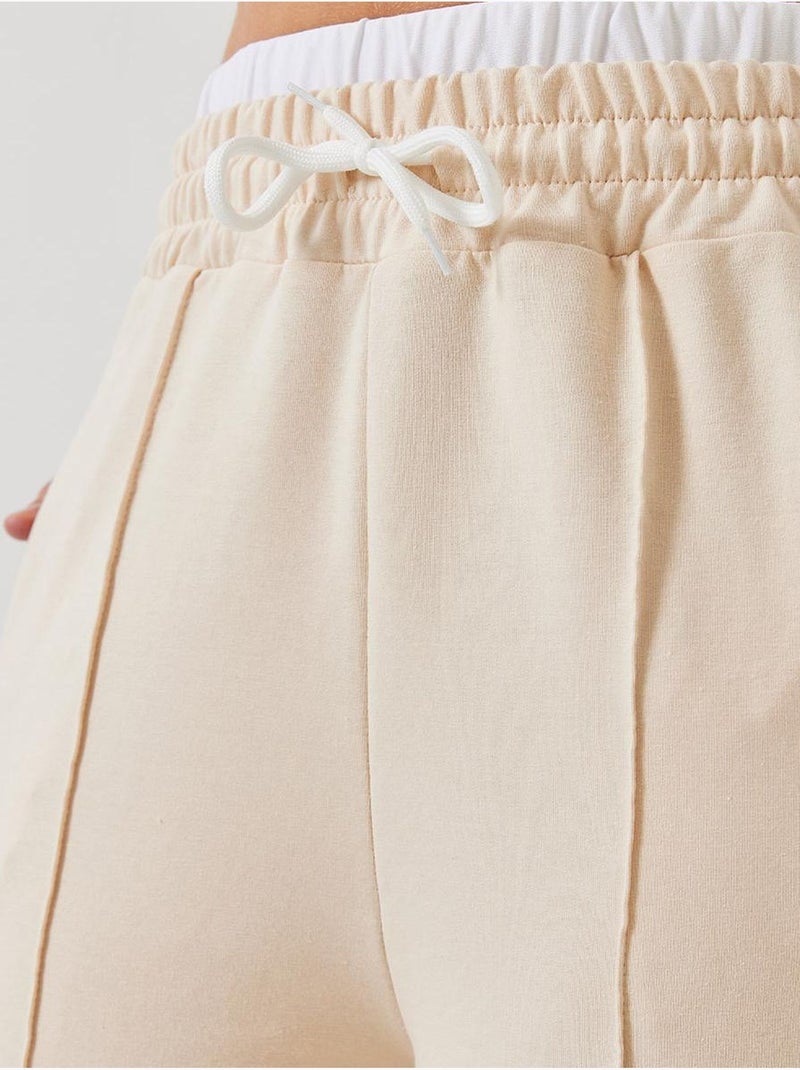 Pantaloni a gamba ampia con dettaglio cintura lucci Beige argilla - Kiabi