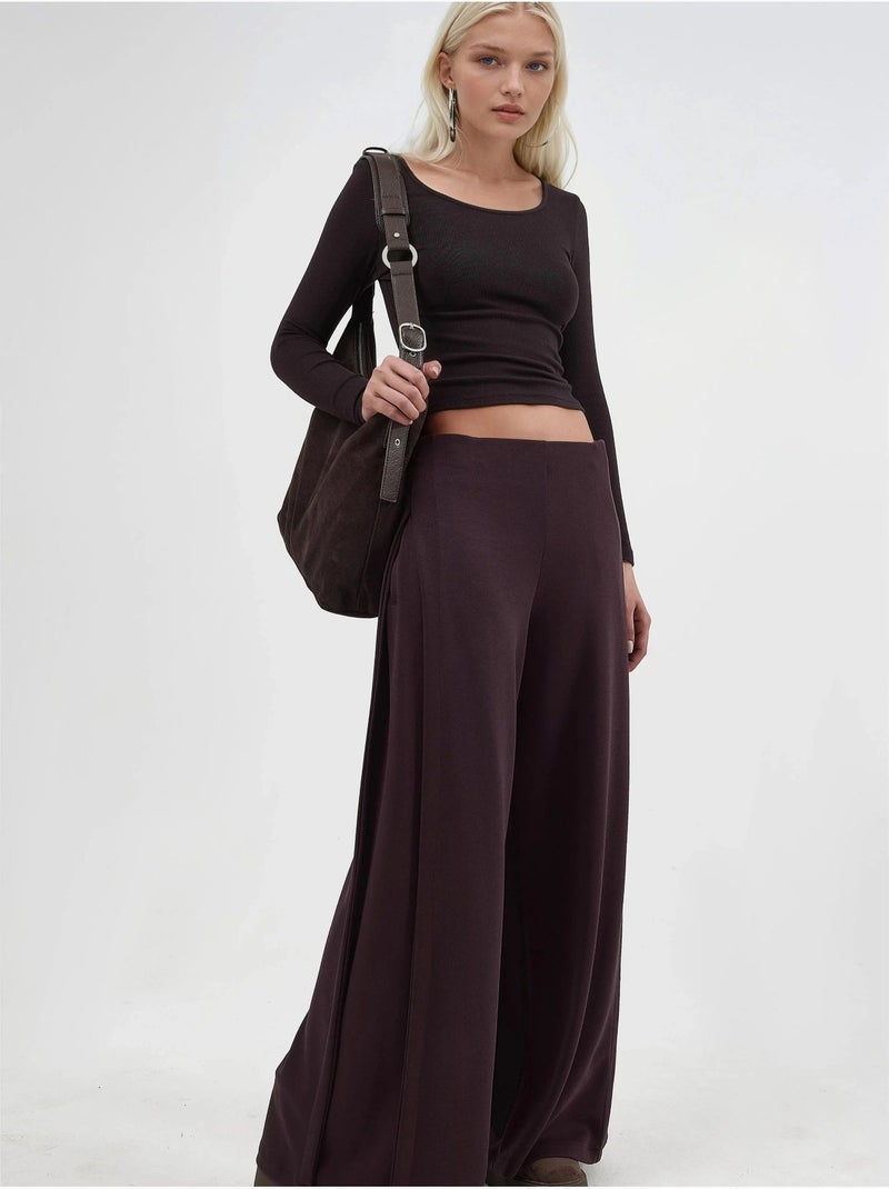 Pantaloni a gamba ampia con pieghe busem Rosso bordeaux - Kiabi