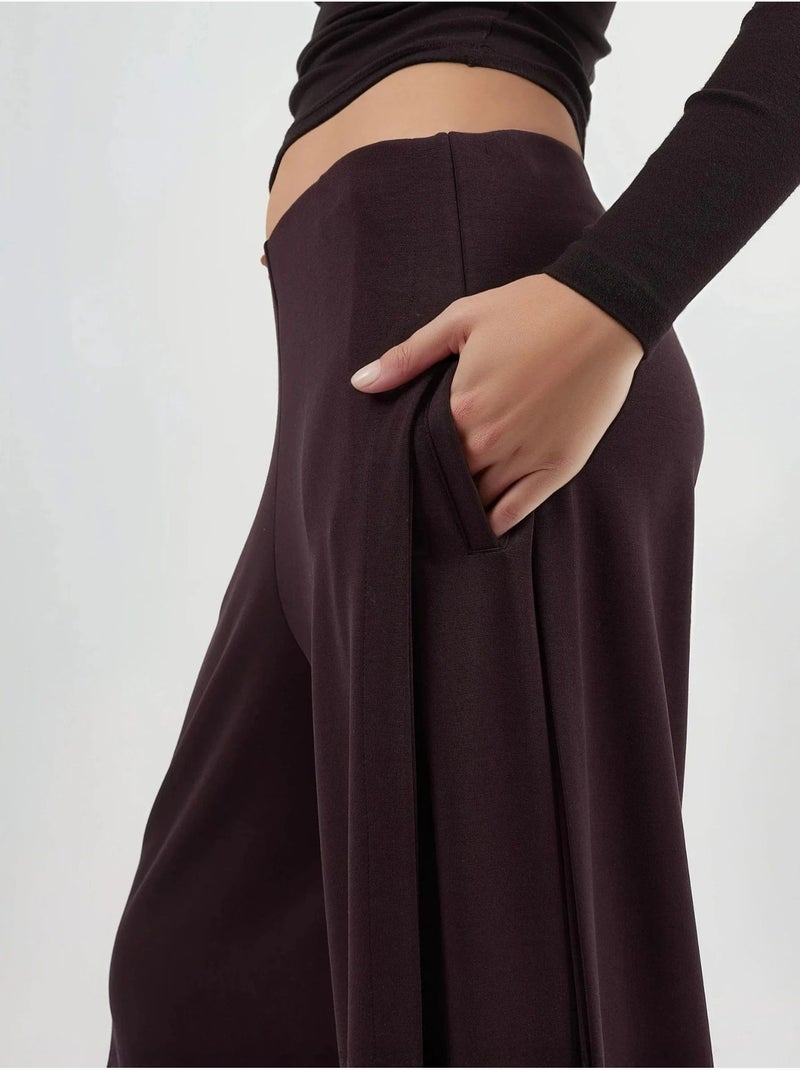 Pantaloni a gamba ampia con pieghe busem Rosso bordeaux - Kiabi