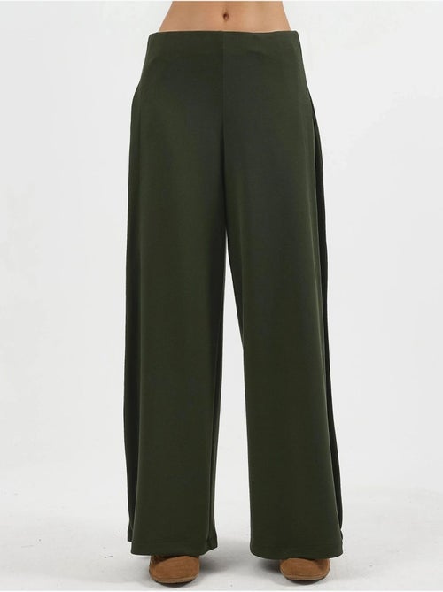Pantaloni a gamba ampia con pieghe busem - Kiabi Pantaloni a gamba ampia con pieghe busem - Kiabi