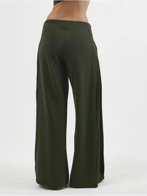 Pantaloni a gamba ampia con pieghe busem - Kiabi Pantaloni a gamba ampia con pieghe busem - Kiabi