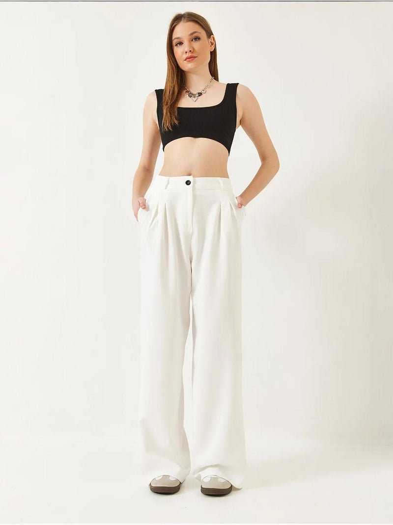 Pantaloni a gamba ampia con pieghe lucci Bianco - Kiabi
