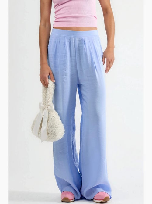 Pantaloni a gamba ampia con pince busem - Kiabi Pantaloni a gamba ampia con pince busem - Kiabi