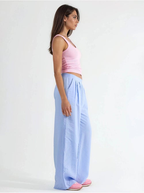 Pantaloni a gamba ampia con pince busem - Kiabi Pantaloni a gamba ampia con pince busem - Kiabi