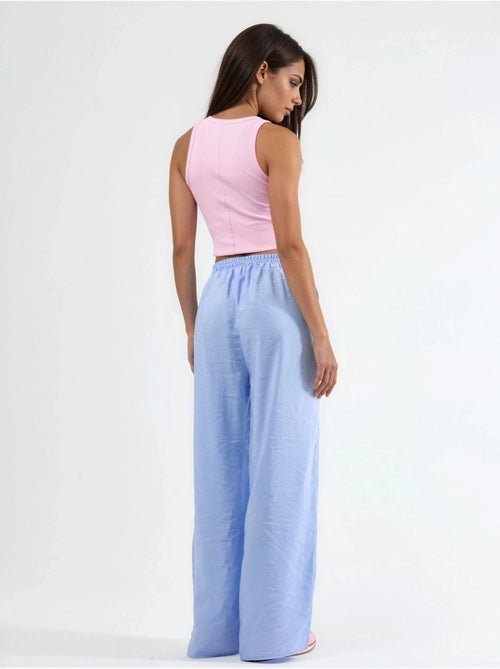 Pantaloni a gamba ampia con pince busem - Kiabi Pantaloni a gamba ampia con pince busem - Kiabi