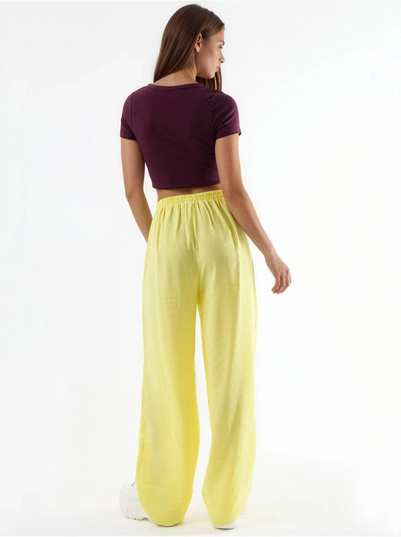 Pantaloni a gamba ampia con pince busem Giallo limone - Kiabi