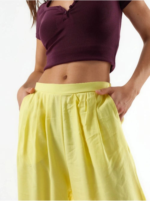 Pantaloni a gamba ampia con pince busem - Kiabi Pantaloni a gamba ampia con pince busem - Kiabi