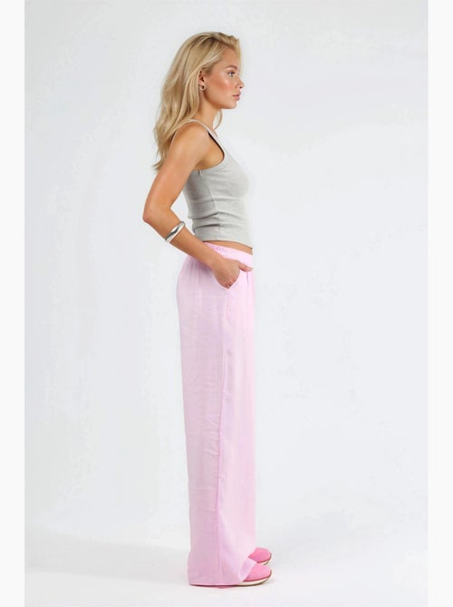 Pantaloni a gamba ampia con pince busem - Kiabi Pantaloni a gamba ampia con pince busem - Kiabi