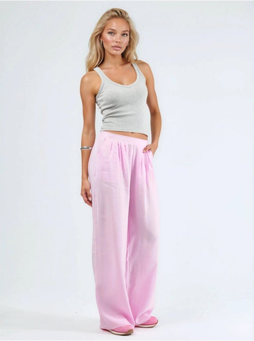 Pantaloni a gamba ampia con pince busem - Kiabi Pantaloni a gamba ampia con pince busem - Kiabi