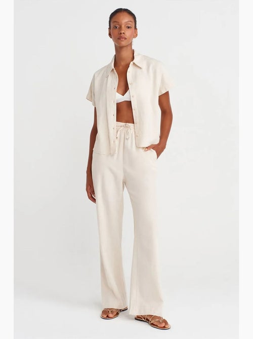 Pantaloni a gamba ampia con vita con coulisse dilvin - Kiabi Pantaloni a gamba ampia con vita con coulisse dilvin - Kiabi
