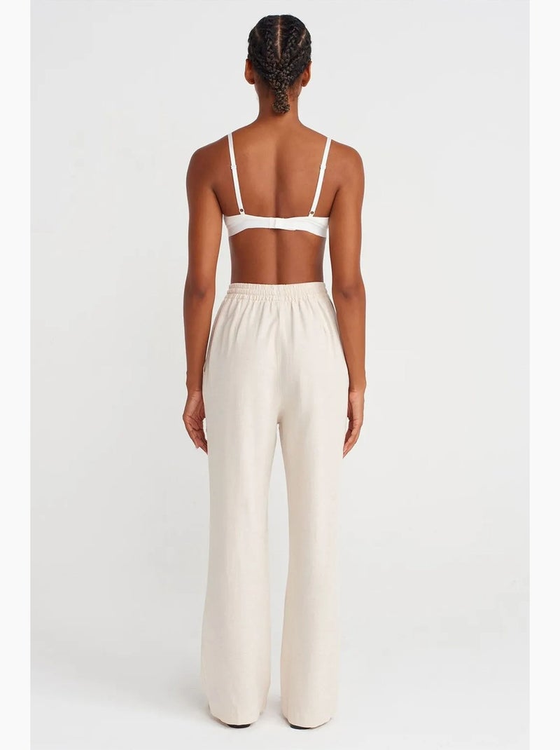 Pantaloni a gamba ampia con vita con coulisse dilvin Beige naturale - Kiabi