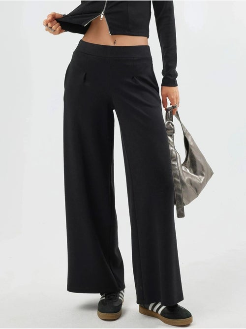Pantaloni a gamba ampia con vita elasticizzata busem - Kiabi Pantaloni a gamba ampia con vita elasticizzata busem - Kiabi