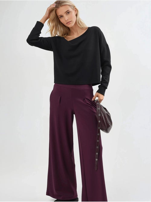 Pantaloni a gamba ampia con vita elasticizzata busem - Kiabi Pantaloni a gamba ampia con vita elasticizzata busem - Kiabi