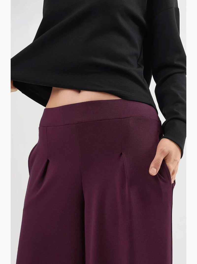Pantaloni a gamba ampia con vita elasticizzata busem Rosso bordeaux - Kiabi