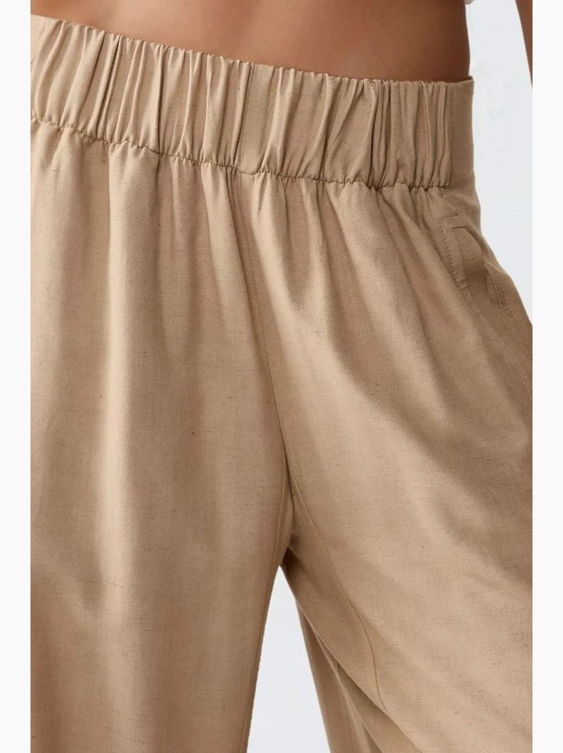 Pantaloni a gamba ampia con vita elasticizzata hiccup Beige - Kiabi