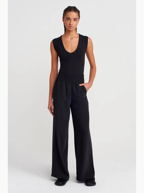 Pantaloni a gamba ampia in crêpe da donna dilvin - Kiabi