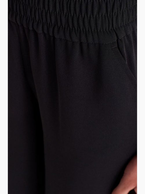 Pantaloni a gamba ampia in crêpe da donna dilvin - Kiabi
