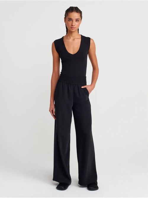 Pantaloni a gamba ampia in crêpe da donna - Kiabi Pantaloni a gamba ampia in crêpe da donna - Kiabi