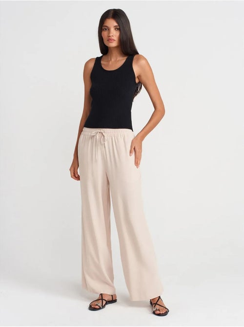 Pantaloni a gamba ampia in tencel con vita con coulisse dilvin - Kiabi Pantaloni a gamba ampia in tencel con vita con coulisse dilvin - Kiabi