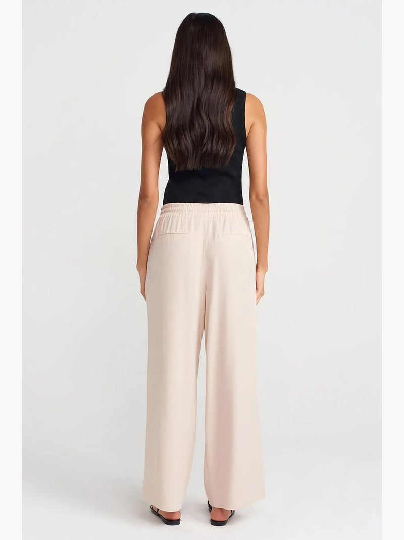 Pantaloni a gamba ampia in tencel con vita con coulisse dilvin Crema - Kiabi