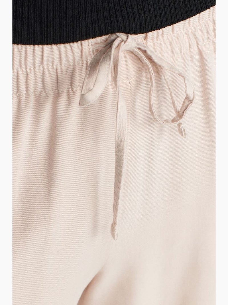 Pantaloni a gamba ampia in tencel con vita con coulisse dilvin Crema - Kiabi