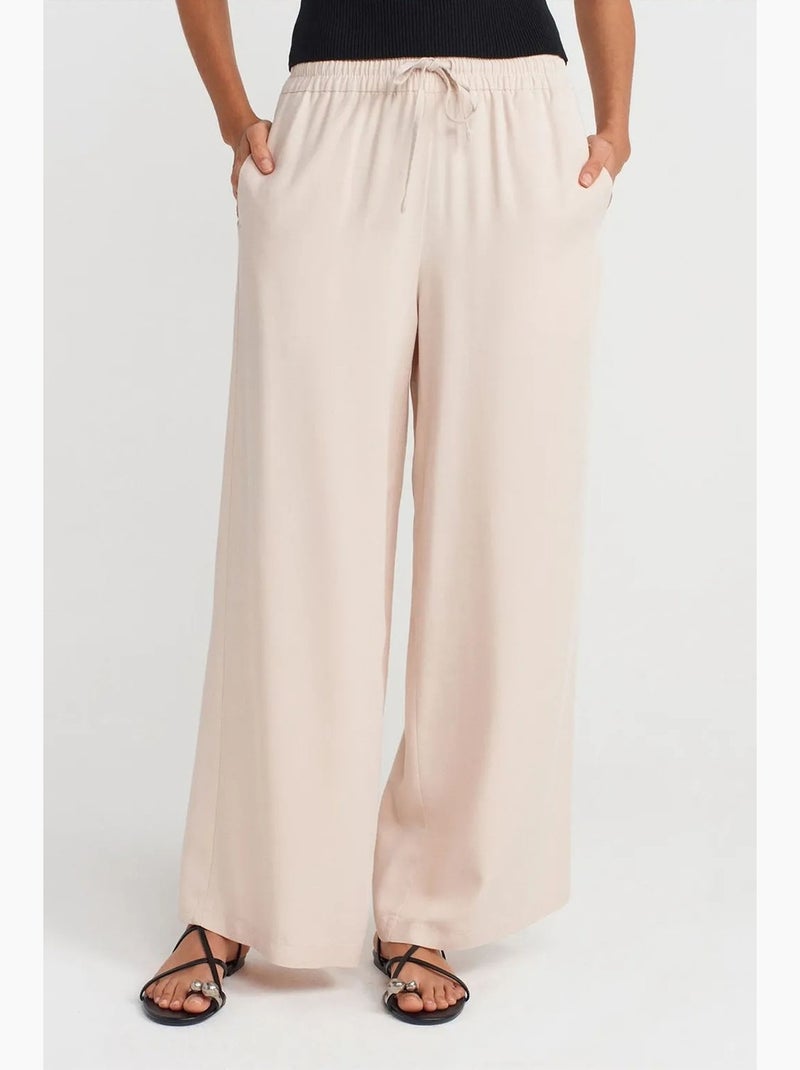 Pantaloni a gamba ampia in tencel con vita con coulisse dilvin Crema - Kiabi