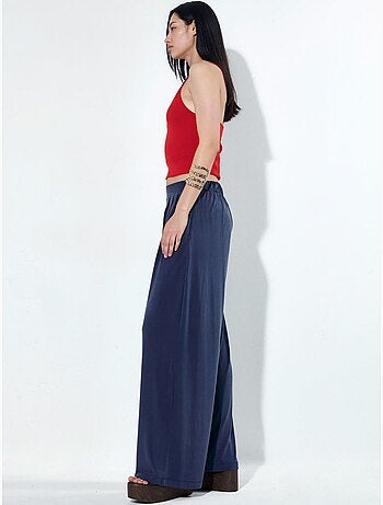 Pantaloni a gamba ampia plissettati con tasche busem