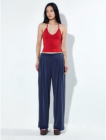 Pantaloni a gamba ampia plissettati con tasche busem