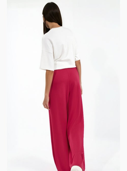 Pantaloni a gamba ampia plissettati con tocco modal hiccup - Kiabi Pantaloni a gamba ampia plissettati con tocco modal hiccup - Kiabi