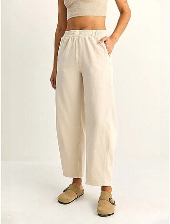 Pantaloni a gamba dritta con vita elastica e tasche lucci