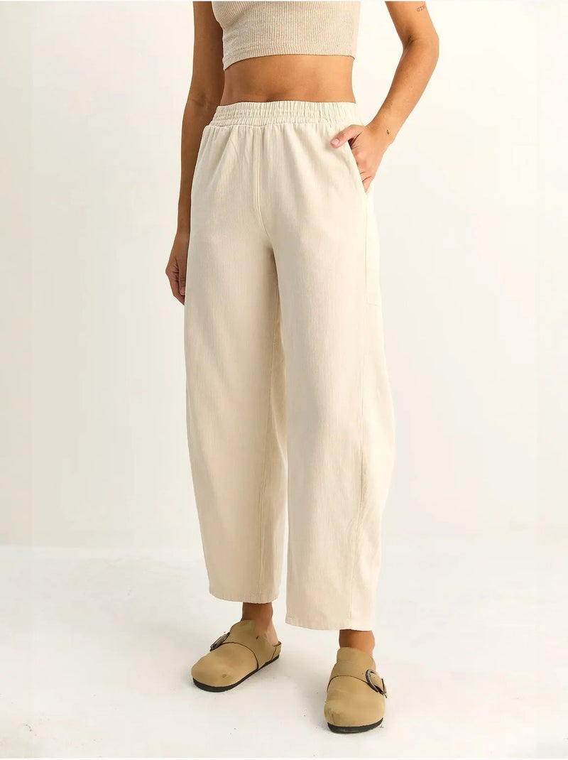 Pantaloni a gamba dritta con vita elastica e tasche lucci Crema - Kiabi