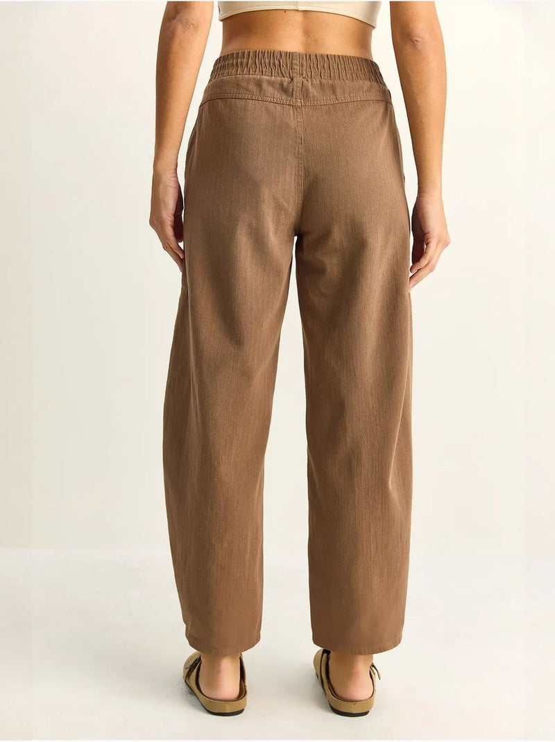 Pantaloni a gamba dritta con vita elastica e tasche lucci Marrone chiaro - Kiabi