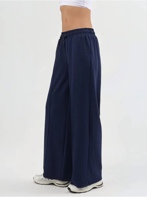 Pantaloni a gamba dritta con vita elasticizzata busem - Kiabi Pantaloni a gamba dritta con vita elasticizzata busem - Kiabi