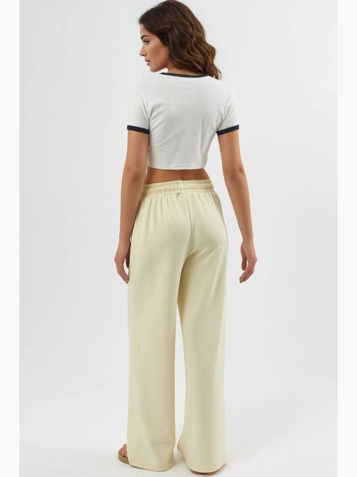Pantaloni a gamba dritta con vita elasticizzata busem - Kiabi Pantaloni a gamba dritta con vita elasticizzata busem - Kiabi