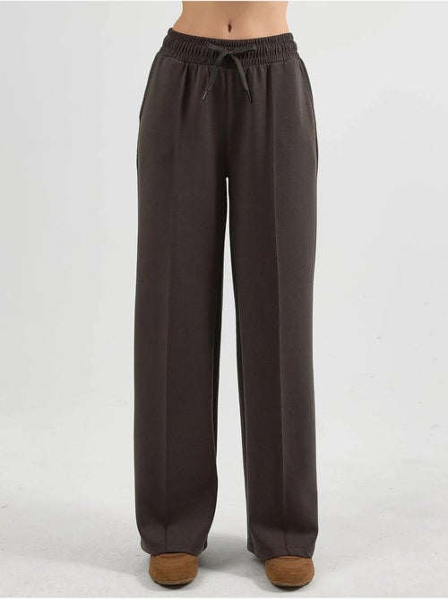 Pantaloni a gamba dritta con vita elasticizzata busem - Kiabi Pantaloni a gamba dritta con vita elasticizzata busem - Kiabi