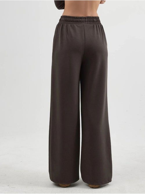 Pantaloni a gamba dritta con vita elasticizzata busem - Kiabi Pantaloni a gamba dritta con vita elasticizzata busem - Kiabi