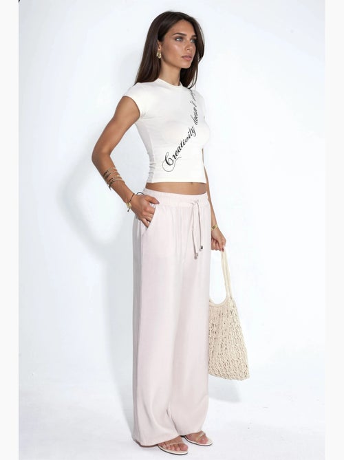 Pantaloni a gamba dritta con vita elasticizzata e tocco modal hiccup - Kiabi Pantaloni a gamba dritta con vita elasticizzata e tocco modal hiccup - Kiabi