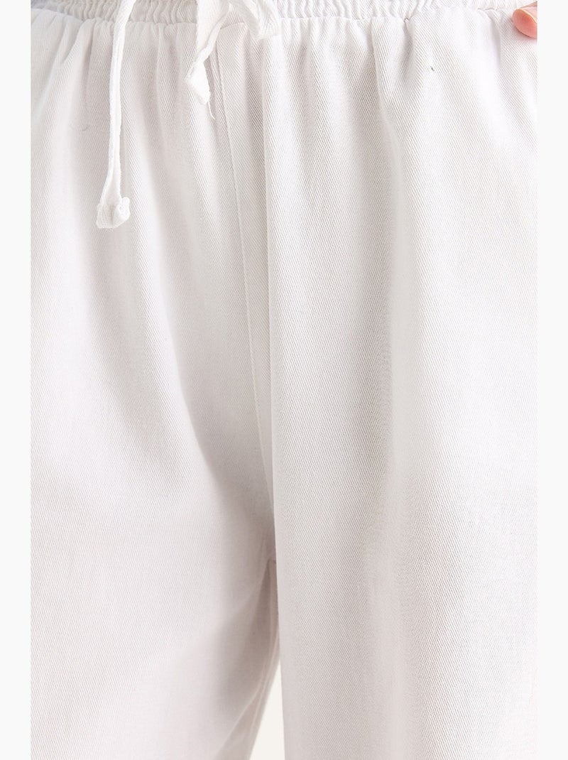 Pantaloni a gamba dritta con vita elasticizzata lucci Bianco - Kiabi