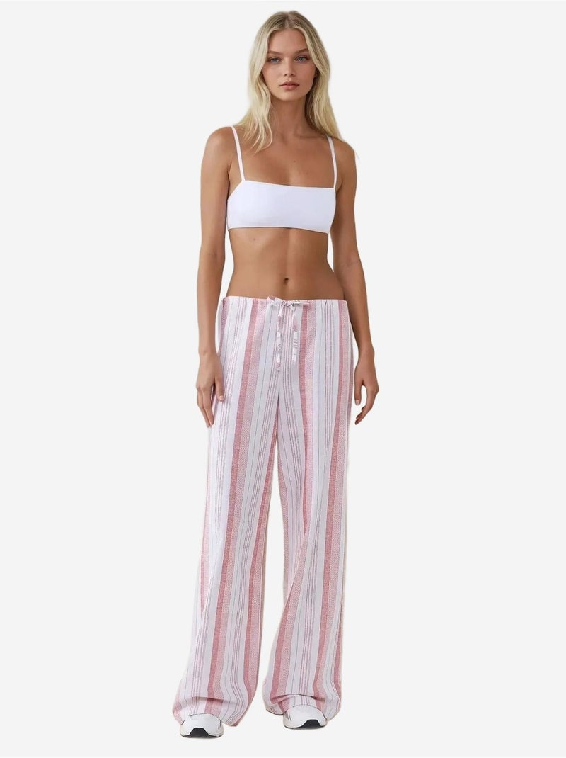 Pantaloni a gamba larga a righe dalla vestibilità rilassata hiccup Rosa confetto - Kiabi