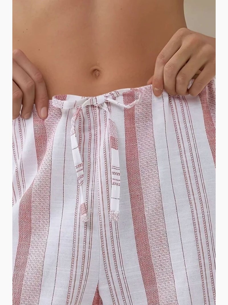 Pantaloni a gamba larga a righe dalla vestibilità rilassata hiccup Rosa confetto - Kiabi