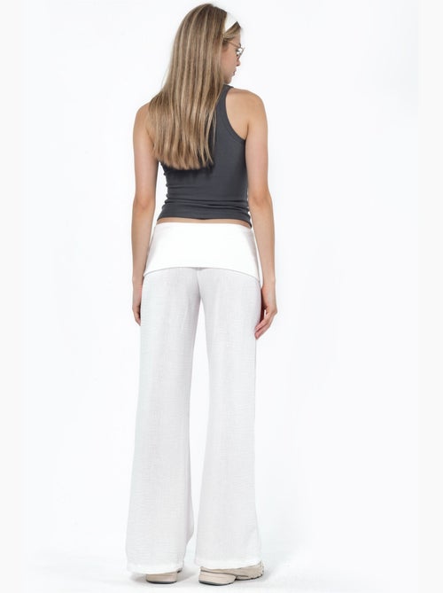 Pantaloni a gamba larga a vita alta busem - Kiabi Pantaloni a gamba larga a vita alta busem - Kiabi