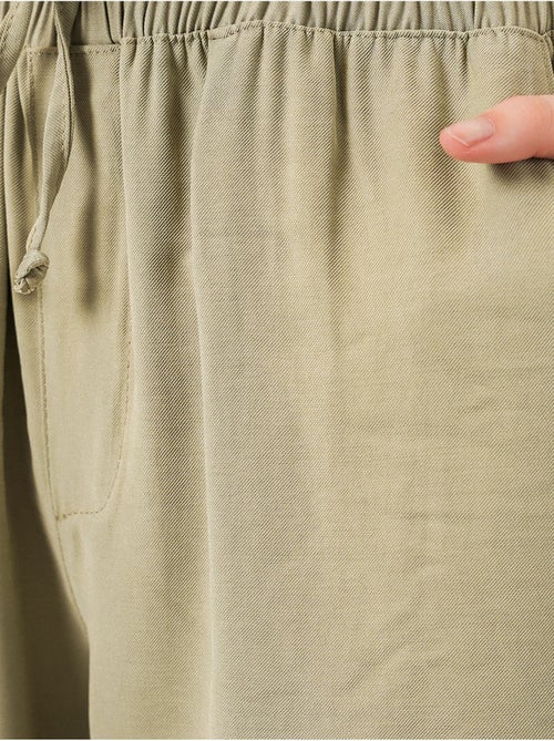 Pantaloni a gamba larga a vita alta con tasca bdart - Kiabi Pantaloni a gamba larga a vita alta con tasca bdart - Kiabi